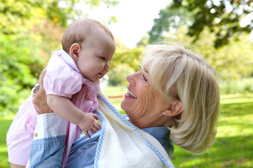 Happy grandmother with cute baby