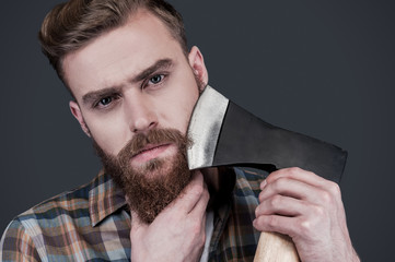 Shaving with axe.
