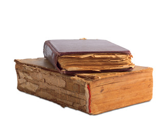 A stack of old books with gold stamping on a white background is