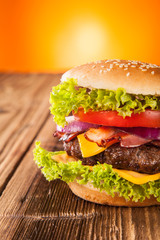 Fresh hamburger on wooden planks