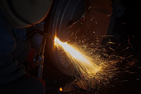 Welder worker is welding