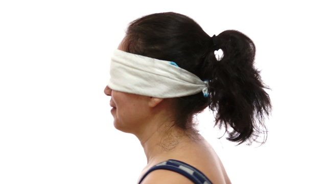 Blindfolded Woman Twirling Around