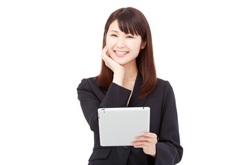 タブレットを持って喜ぶビジネスウーマン