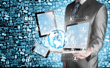 Business man using tablet PC and smartphone social connection