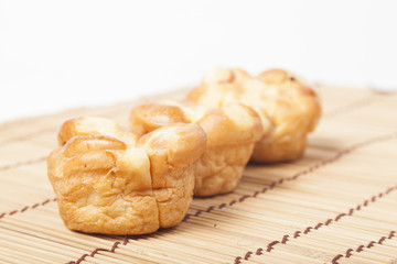 Loaf of bread on wooden plate