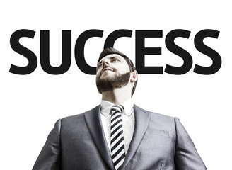 Business man with the text Success in a concept image