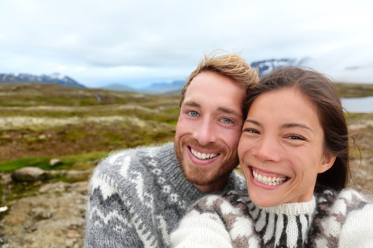 Iceland couple selfie wearing Icelandic sweaters