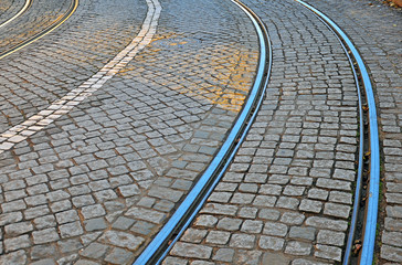 Road with tiled floor and tram lines