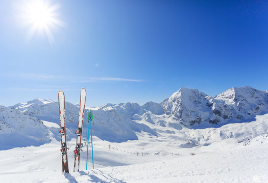 Skiing , mountains and ski equipments on ski run