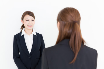 asian businesswomen talking on white background