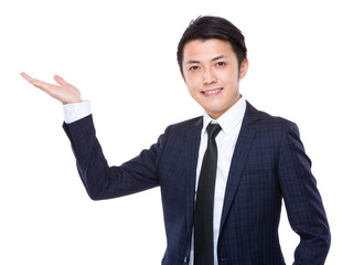 Businessman with hand present
