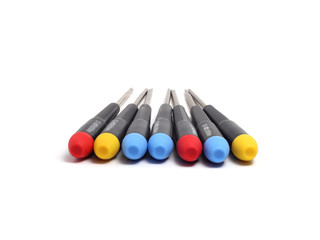 seven screwdrivers with colorful handles to us