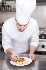 Chef Completing Pasta.