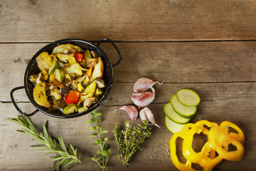 Spanish tapas presented on a wooden floor