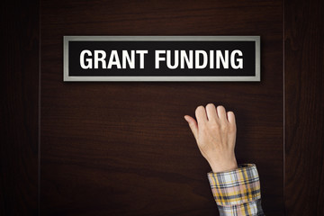 Hand is knocking on Grant Funding door