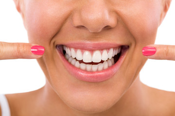 Woman showing her perfect teeth - obrazy, fototapety, plakaty
