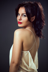 Naklejka premium young girl in sexy dress