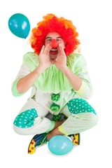 Funny clown shouting at camera