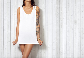 Woman wearing blank sleeveless t-shirt