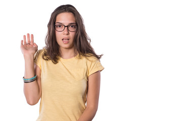 Cute Young Girl With Glasses posing on isolated waving