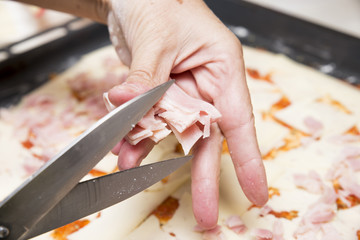 cutting fresh ham