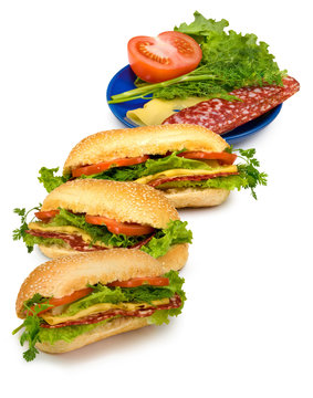 three sandwiches on white background