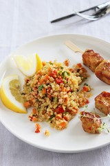 Quinoa salad with vegetables,herbs and lemon.