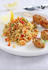 Quinoa salad with vegetables and roasted meat