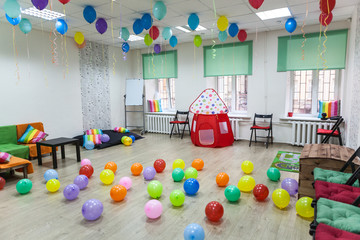 Children's room decorated with balloons ready for the holiday