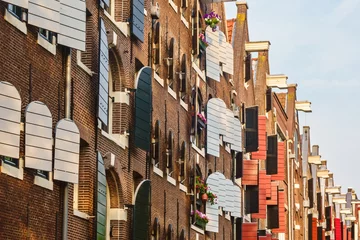 Zelfklevend Fotobehang Ancient warehouses in the city of Amsterdam © Martin Bergsma