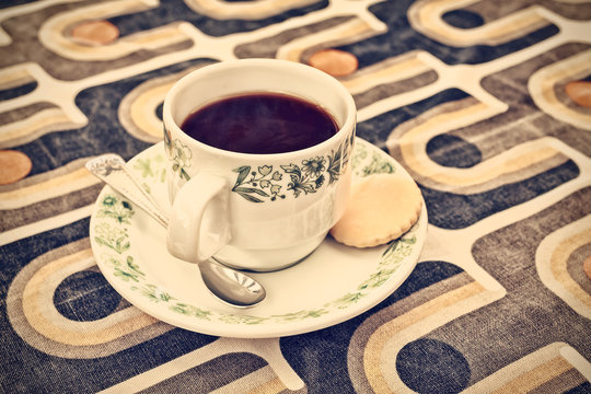 Retro styled image of a cup of coffee