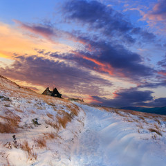 Fototapeta premium Winter mountain landscape and beautiful sunset