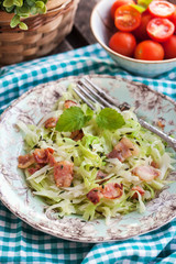 Braised cabbage with bacon and thyme