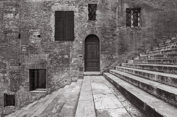 Classic Door, Windows,Wall and Staircase in Siena, Italy