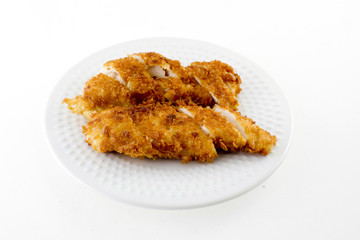 crispy chicken on white plates isolate on white backkground