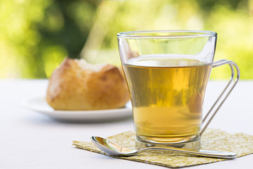 Hot Tea and brioche in garden