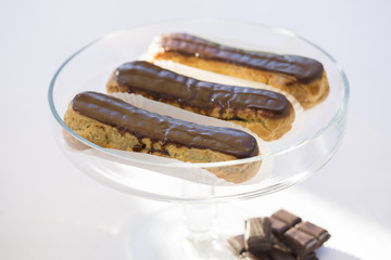 Delicious French Chocolate eclairs on plate