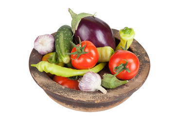 Garlic, eggplants, tomatoes, onion, cucumbers and peppers in old