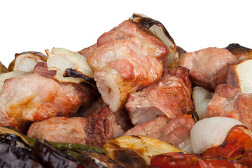 Meat with potatoes, eggplants, tomatoes, onions and peppers on t