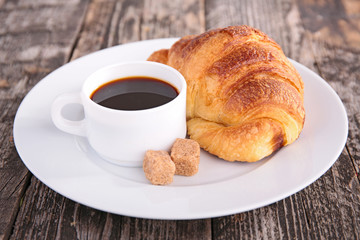 coffee cup and croissant