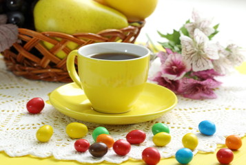 Cup of coffee and candeis