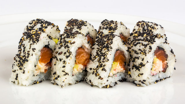 triangular sushi with sesame seeds