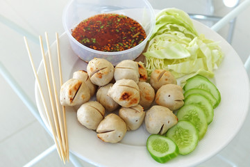 Meat ball with vegetables and sauce