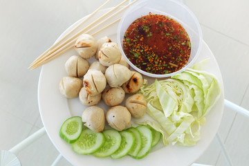 Meat ball with vegetables and sauce