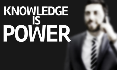 Business man with the text Knowledge is Power