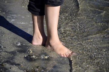 Feet in river