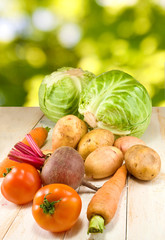 fresh vegetables on green background closeup