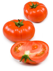 three ripe tomatoes on white background