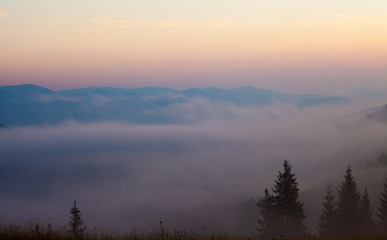 Naklejka na ściany i meble Majestic sunset in the mountains landscape