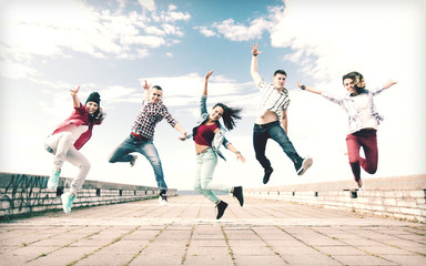 group of teenagers jumping